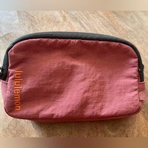 Lululemon mini-belt bag! Pink/olive green.